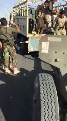 Kurdish Peshmerga arresting their fighters fleeing with all their ammunition from Kirkuk city   