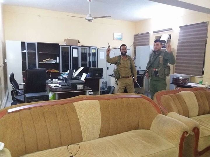 Iraqi PMUs take over Sinjar in northern Iraq after the Peshmerga withdrew   