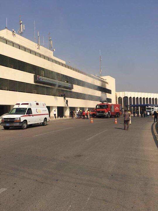 Fire brigade at Baghdad International airport following fire smoke.   