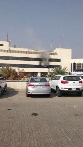 Fire brigade at Baghdad International airport following fire smoke.   