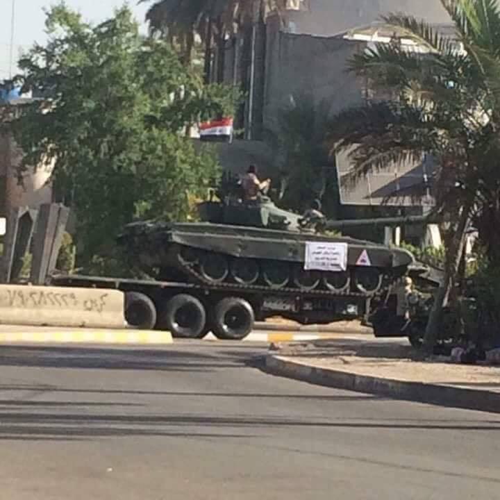 The Iraqi government deploying large numbers of security forces and many tanks, armored vehicle to Al Tahrir Square in Baghdad to confront the expected protests 