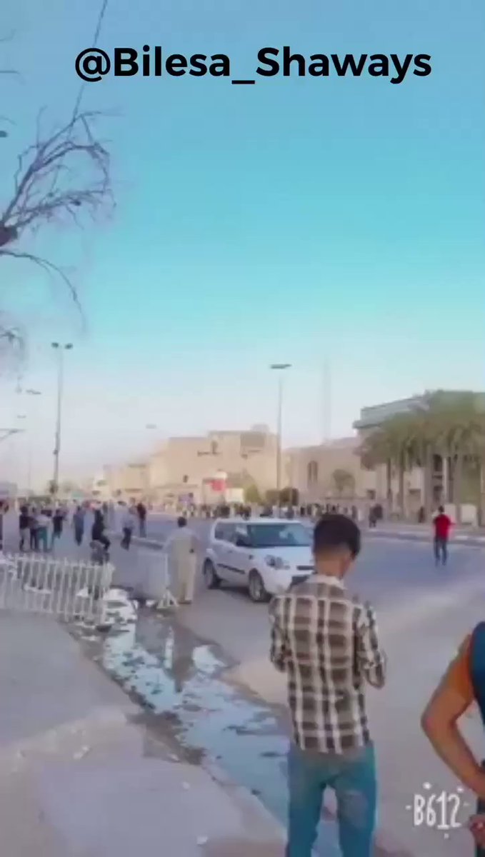 The Fighters Of Asa'ib Ahl al-Haq guards opened fire to disperse protesters in Najaf .   