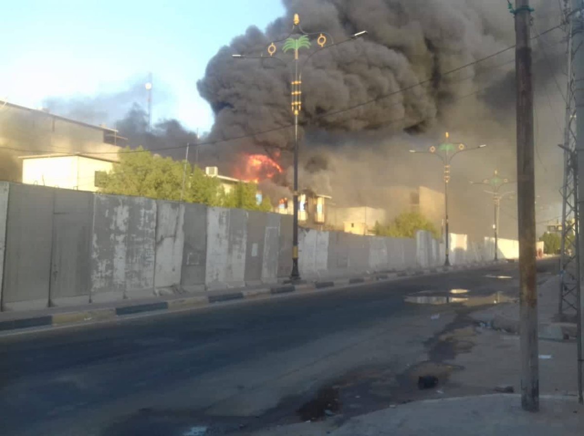 Iraqi protesters burning the municipality building in Basra south of Iraq.   