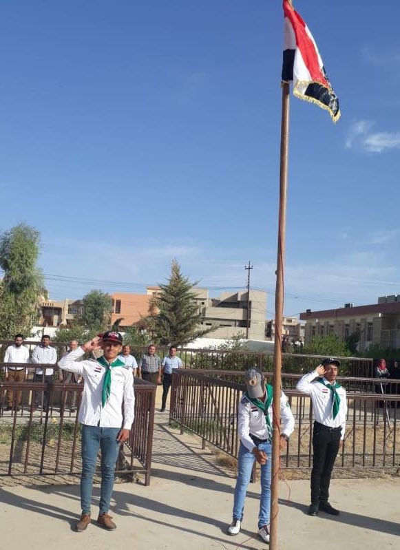 OIR Spokesman: The Ninewah Operations Command in Mosul sent officers to attend the openings of schools across the city. Fear was schools wouldn't open on time, but here they are raising the Iraqi flag. 
