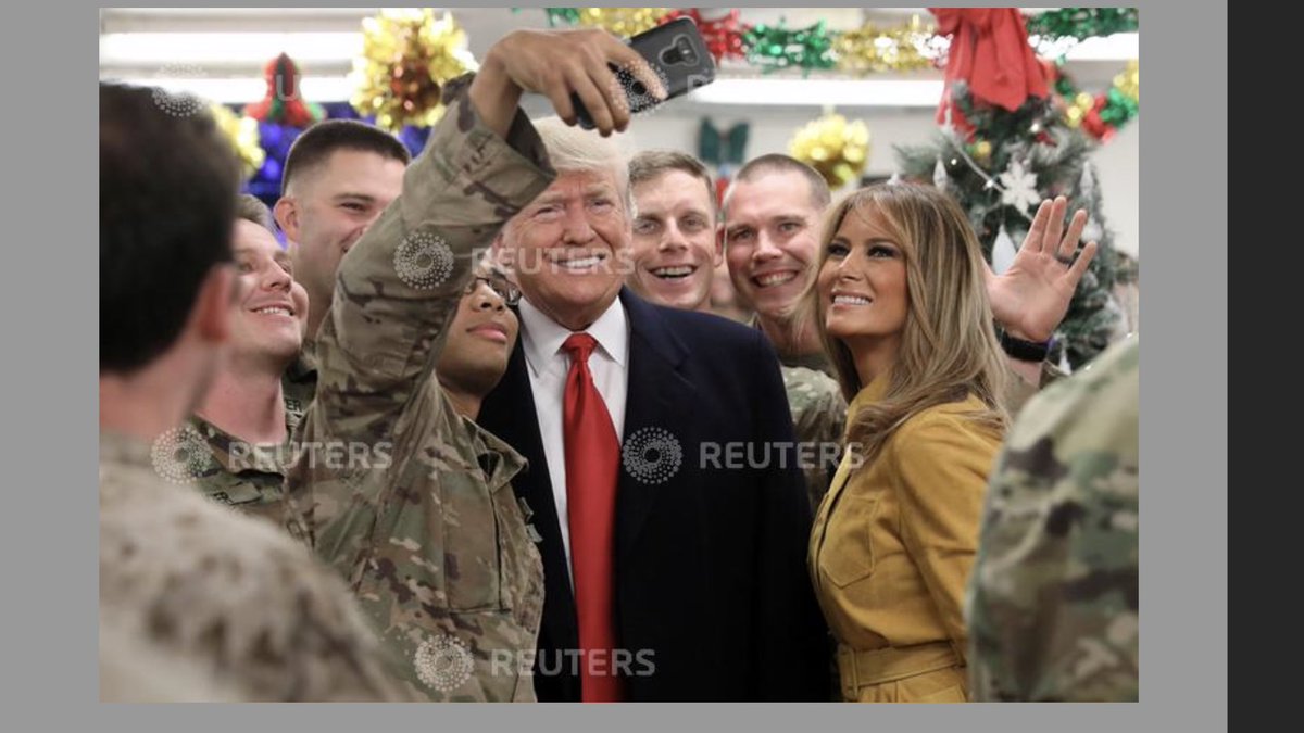 President Trump and first lady Melania Trump are in Iraq, where they greet military personnel at the dining facility during an unannounced visit to Al Asad Air Base, Iraq, Dec. 26, 2018. (REUTERS/Jonathan Ernst)    
