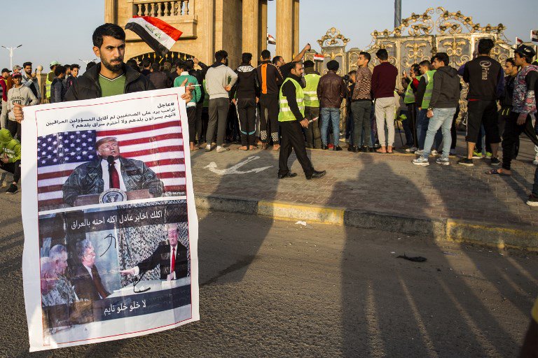 Iraqi protesters wearing yellow vests, imitating the French YellowVests movement, demonstrate against corruption and lack of services in the southern city of Basra on December 28, 2018.   