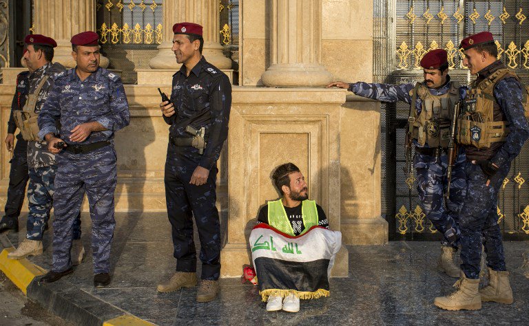 Iraqi protesters wearing yellow vests, imitating the French YellowVests movement, demonstrate against corruption and lack of services in the southern city of Basra on December 28, 2018.   