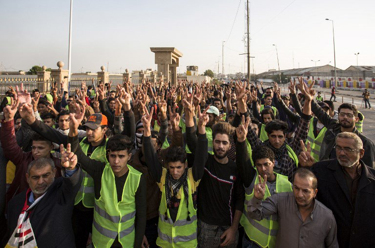 Iraqi protesters wearing yellow vests, imitating the French YellowVests movement, demonstrate against corruption and lack of services in the southern city of Basra on December 28, 2018.   
