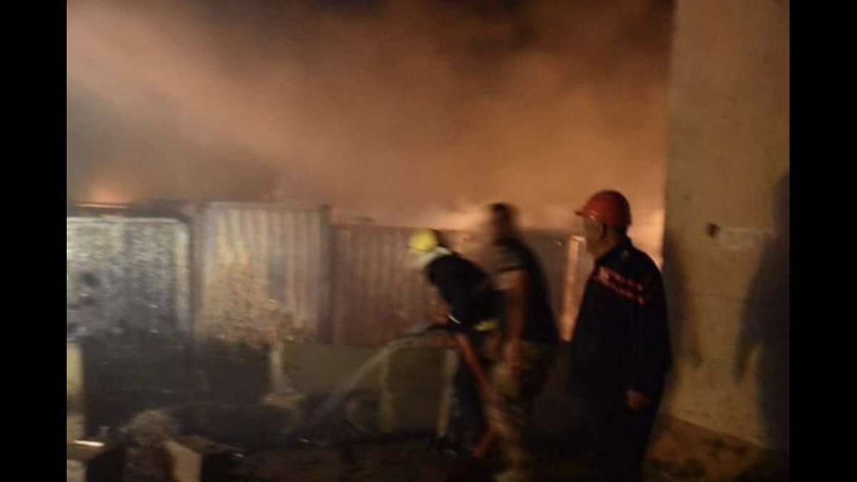 Photos shared also claim to show Iraqi fire services fighting the fires amidst the containers that were at the site of the explosions