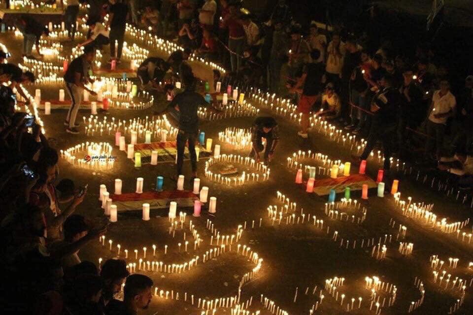 Najaf sit-ins lit candles too.