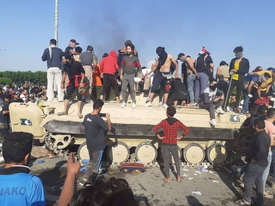 Protesters in Umm Qasr took over a BMP-2 that belongs to Iraq Army 9th Armored Division, 36th Mechanized Brigade