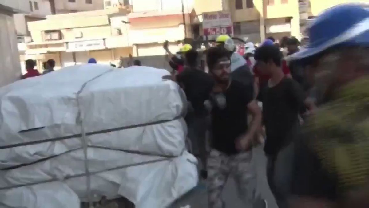 Iraqi security forces open fire to disperse protesters at Shuhada Bridge in Baghdad   