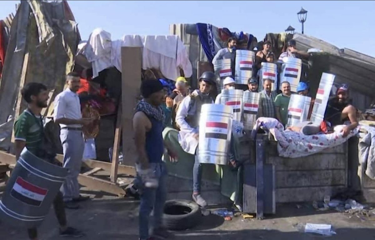 Protesters are creating shields to protect themselves from the tear gas canisters that have killed dozens of protesters since the start of IraqProtests in October 1. 