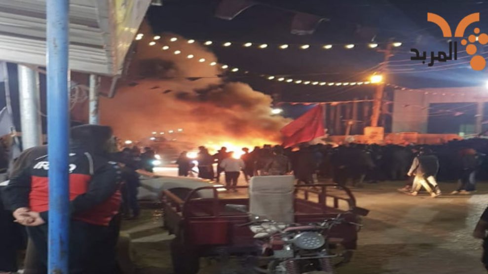 Burning tires near the municipality building of Al-Akika district in Dhi Qar