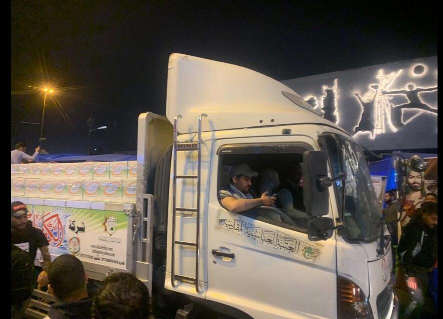 Al-Abbas shrine in Kerbala, run by rep of Sistani, brings water to anti-gov't protesters in Baghdad
