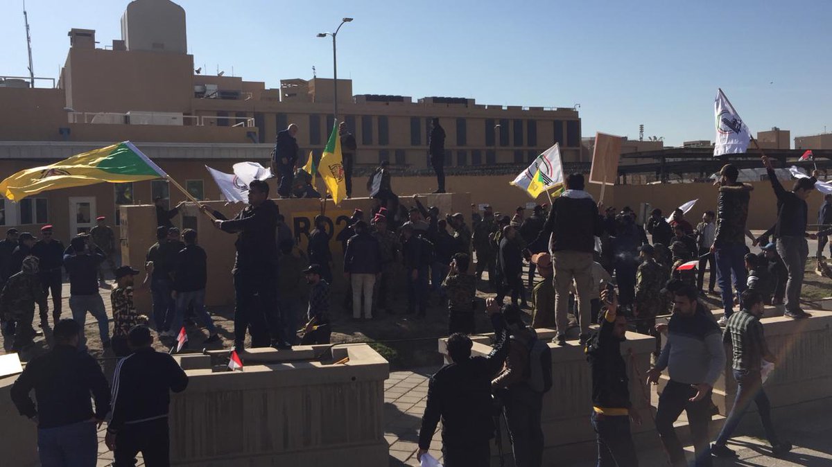 Now, Hezbollah loyalists in front of the American embassy in Baghdad