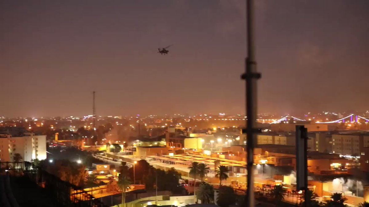 U.S. helicopters fly over the skies of Baghdad to protect the embassy in the Green Zone