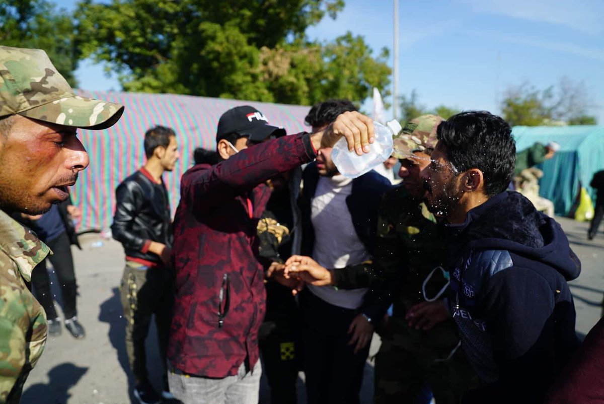 Protection of the American embassy launches tear gas in an attempt to disperse pro-Hezbollah demonstrators 
