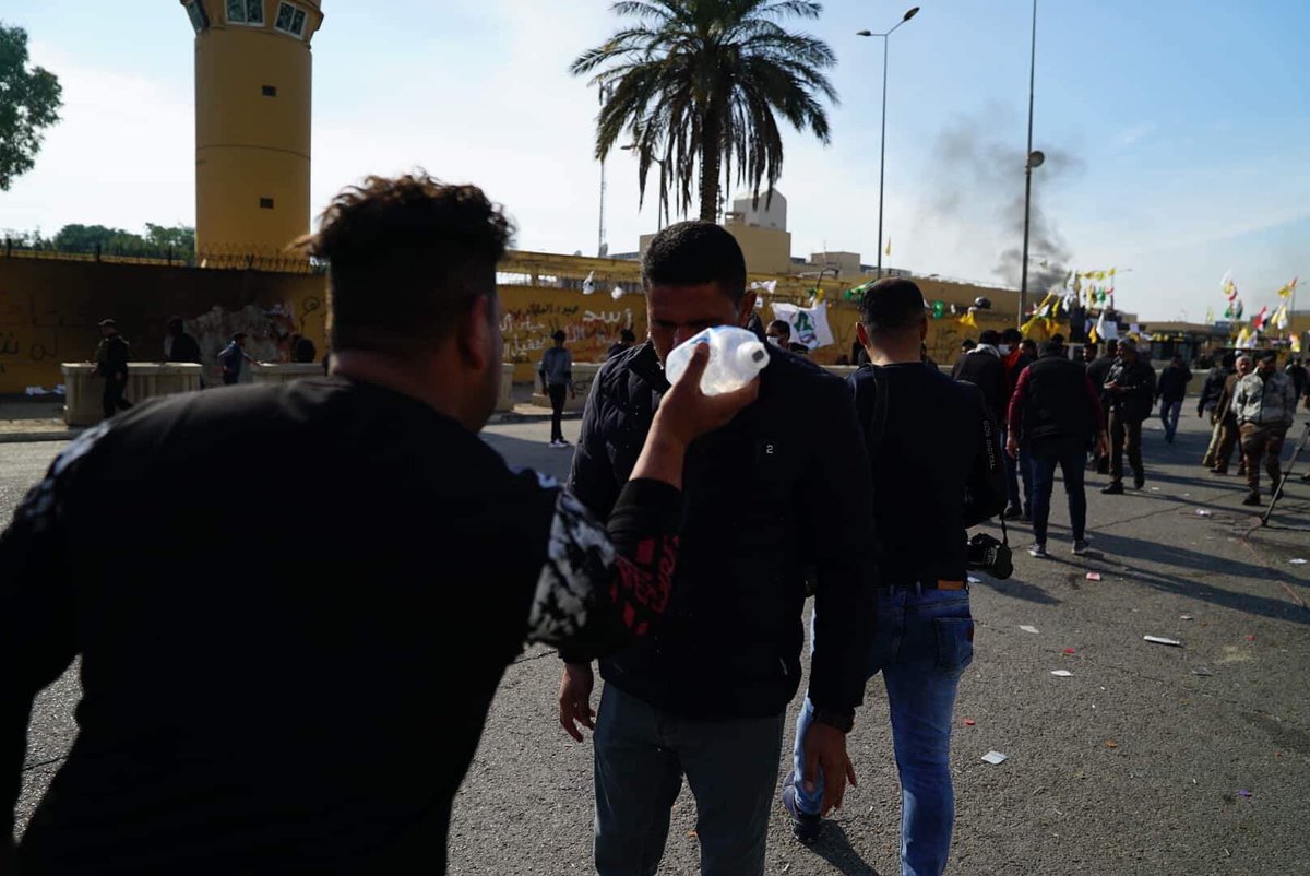 Protection of the American embassy launches tear gas in an attempt to disperse pro-Hezbollah demonstrators 