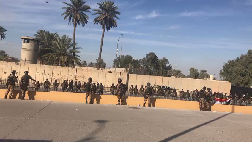 Huge numbers of ISOF on guard at US Embassy in Baghdad Iraq