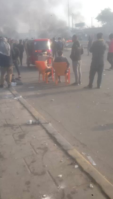 Iraqi security forces attack protesters with life ammunition and tear gas near Mohammad Al Qasim brigade in Baghdad.