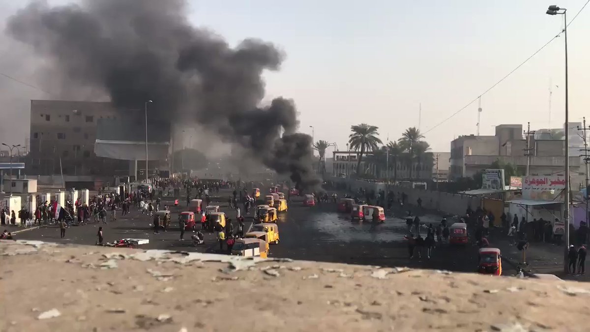 Security forces use live ammunition to disperse protesters in al-Kailani square in Baghdad