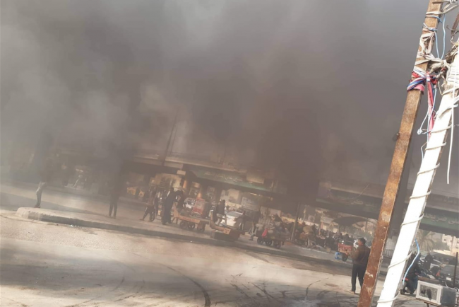 Demonstrators block the main roads in Karbala Governorate, south of Baghdad