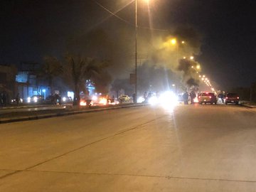 Protesters blocked the Airport Street in Najaf, southern Iraq, with burning tires