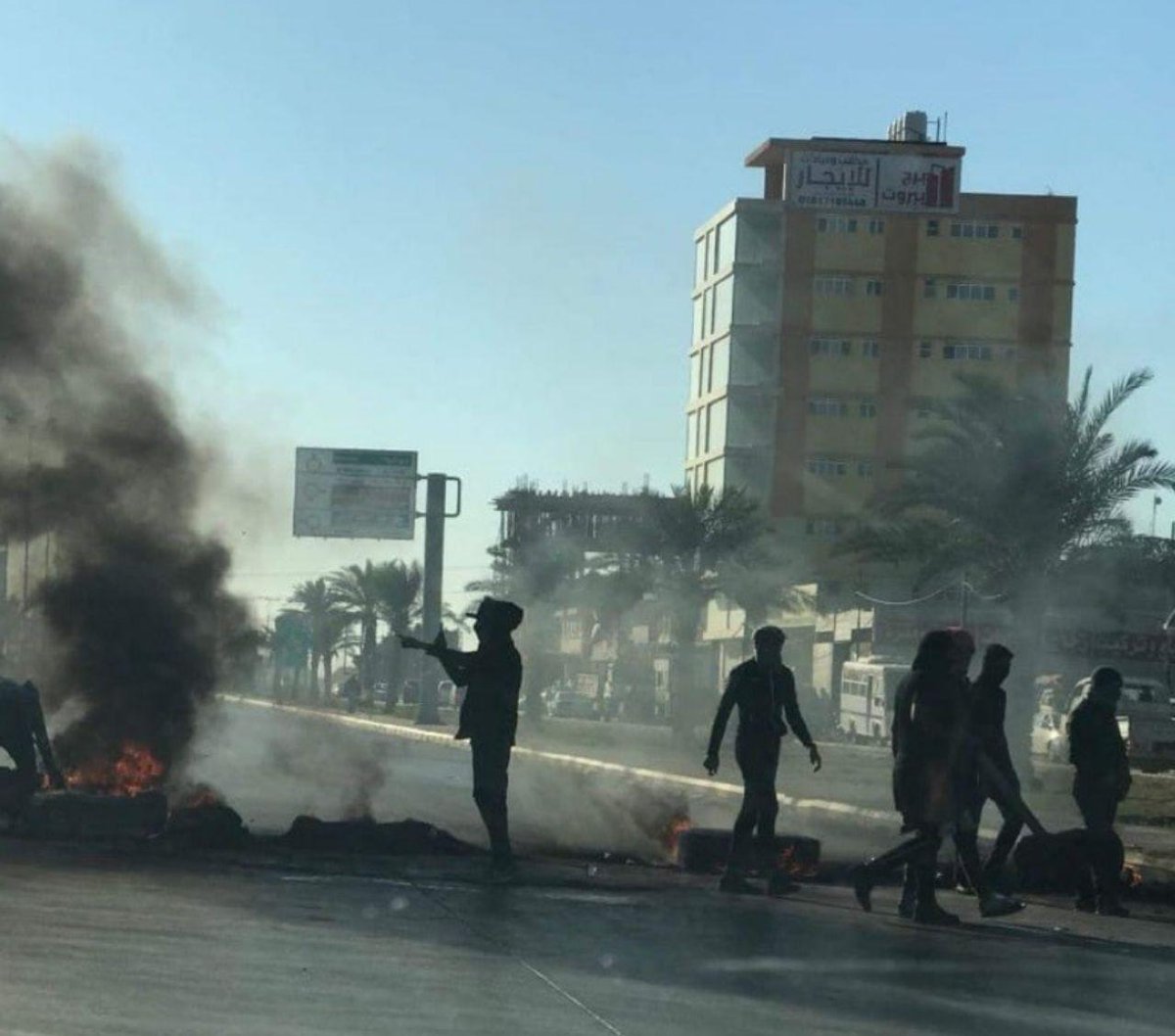 Protesters cut the road to Najaf airport