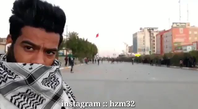 Clashes and confrontations between demonstrators and government forces in Al-Tarbiya Street in Karbala 