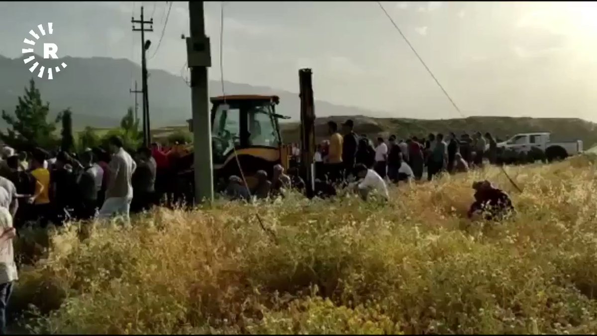 Locals gather in Shiladze's cemetery to mourn the lives of civilians killed in Turkish airstrikes in the town today.   