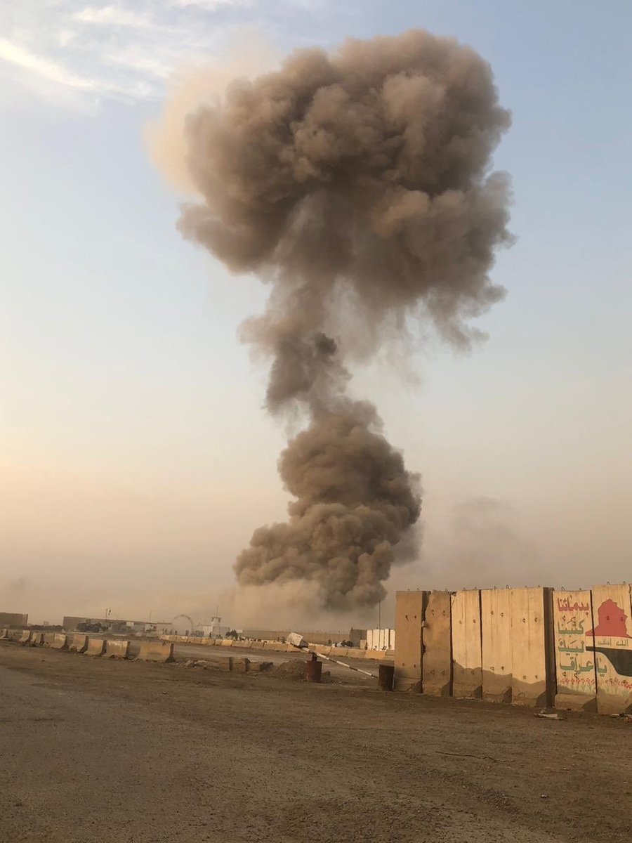 An explosion of unknown nature and billowing of smoke, near Saqr camp in the Dora area, south of the capital, Baghdad. Iraq