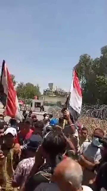 Hundreds of protesters gathering in front of the Baghdad's GreenZone gate , they're protesting against the corruption and asking for basic services