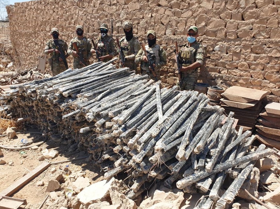 Huge stack of IEDs seized by Upper Euphrates Tribal PMU near Qa'im today.  The ruler-styled pressure plate IEDs number over 1300