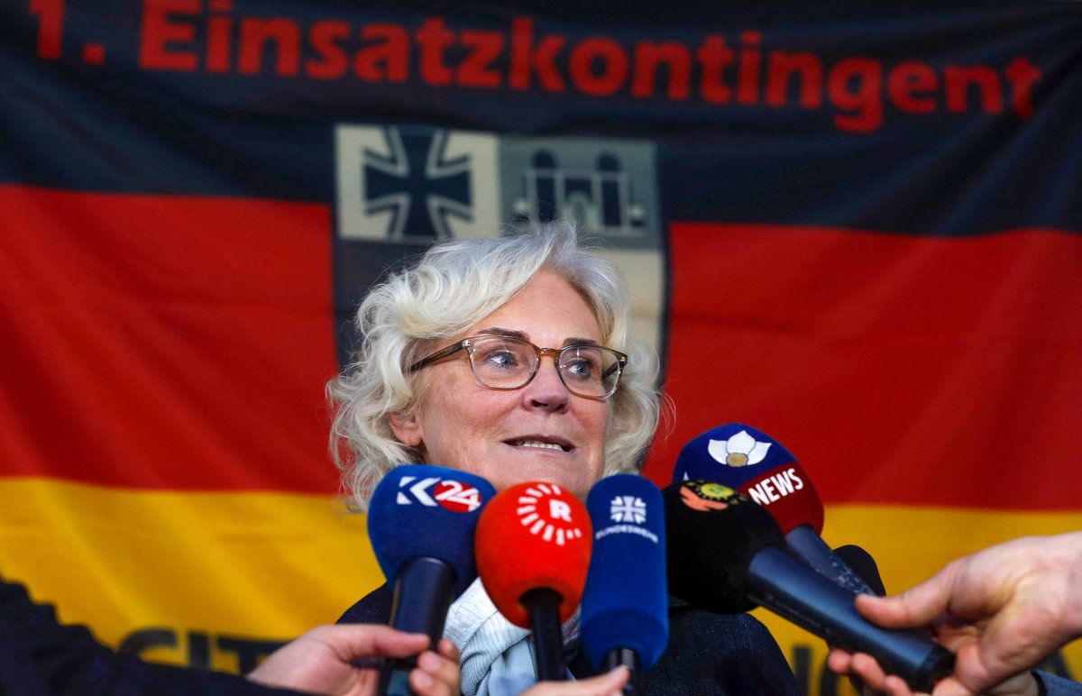 German Defense Minister Christine Lambrecht talks to German soldiers as she visits German armed forces in Erbil, the capital of the autonomous Kurdistan Region on January 9, 2022.  Safin Hamed/AFP