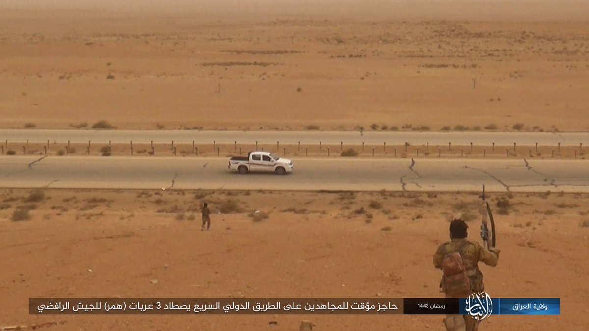 ISIS temporary checkpoint on a highway looking for Iraqi Army in Anbar, Iraq