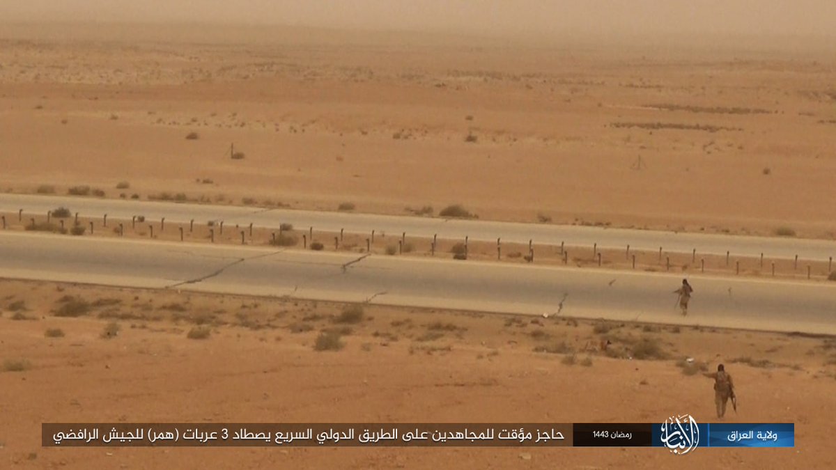 ISIS temporary checkpoint on a highway looking for Iraqi Army in Anbar, Iraq