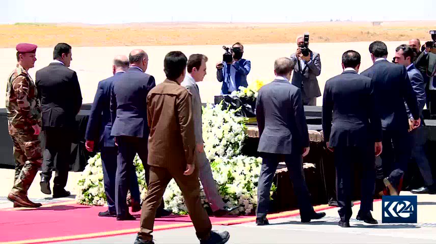 Kurdistan Region President Nechirvan Barzani and Iraqi Foreign Minister Fuad Hussein carry the body of one-year-old Zahra at Erbil International Airport to return her to her hometown. Zahra was the youngest victim of Turkey's artillery bombardment on a Kurdistan Region resort