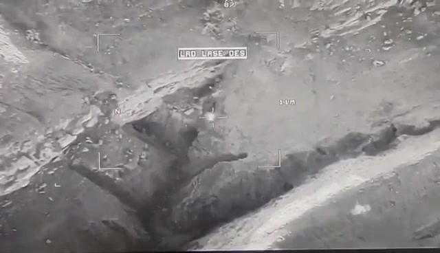 An Iraqi air strike destroys ISIS hideouts & kills a number of them in the Hamrin Mountains