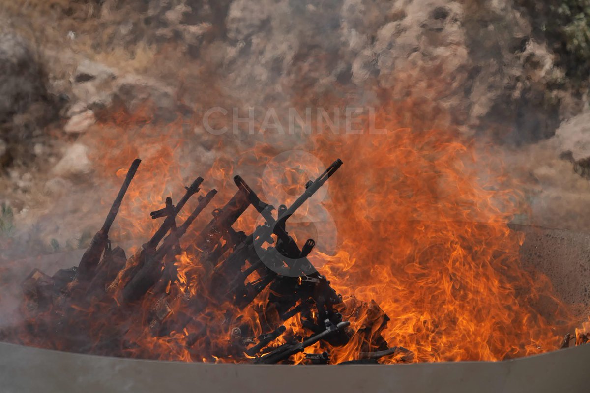 PKK militants burn their weapons in a symbolic ceremony on Friday in Iraq’s Suleymaniyah, vowing to complete the disarmament process as agreed with Turkey