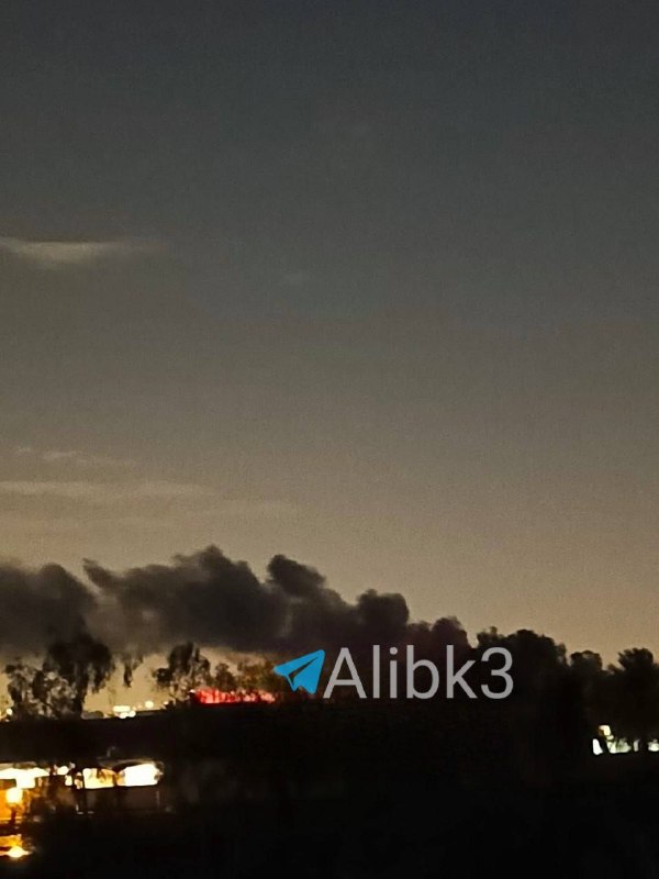 Plumes of smoke rise from the American base at Baghdad airport