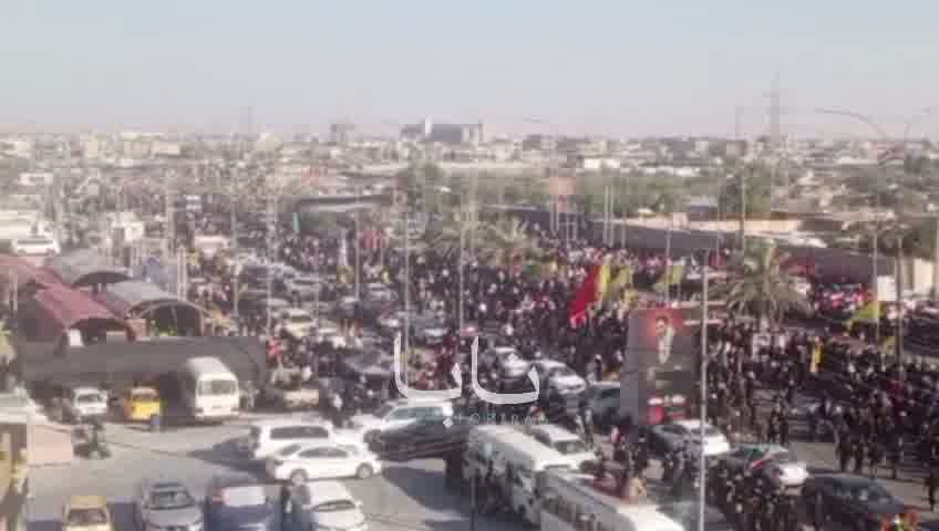 Huge crowds of mourners are waiting for the coffin in the holy city of Karbala.