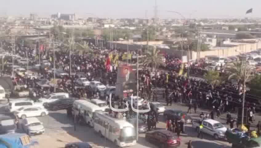 Huge crowds of mourners are waiting for the coffin in the holy city of Karbala.