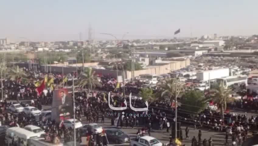 Huge crowds of mourners are waiting for the coffin in the holy city of Karbala.