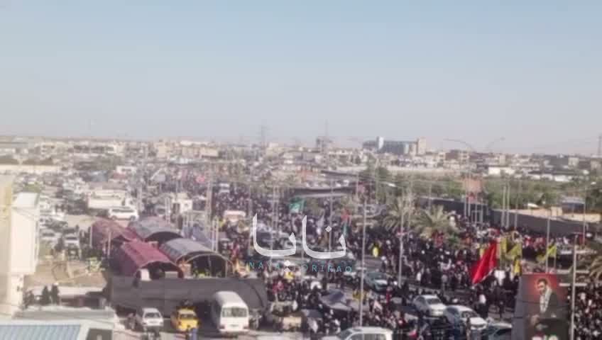 Huge crowds of mourners are waiting for the coffin in the holy city of Karbala.