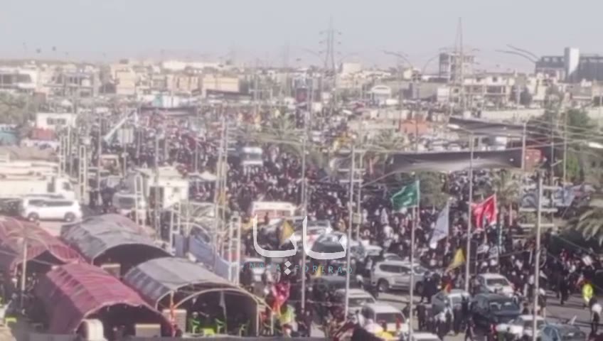 Huge crowds of mourners are waiting for the coffin in the holy city of Karbala.