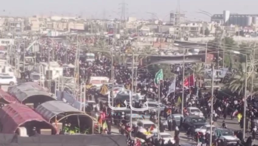 Huge crowds of mourners are waiting for the coffin in the holy city of Karbala.