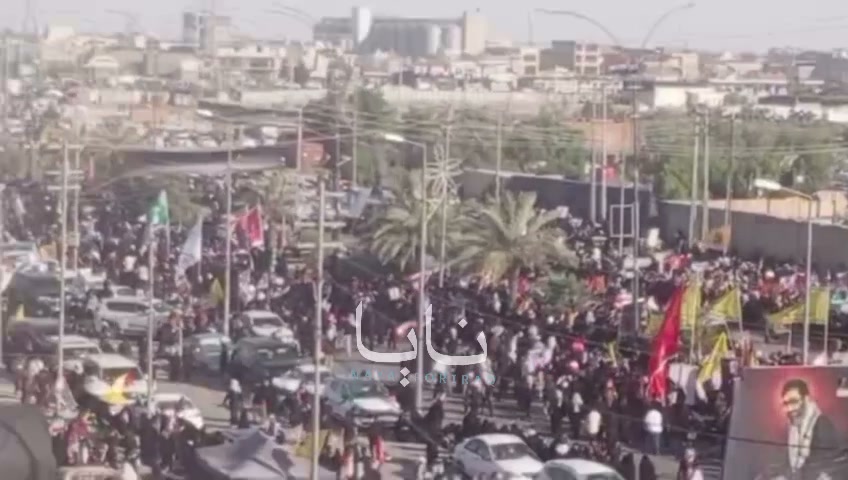 Huge crowds of mourners are waiting for the coffin in the holy city of Karbala.