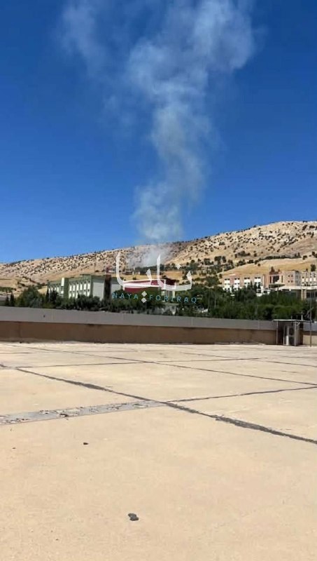Columns of smoke rise from the Koya district in Erbil province, northern Iraq.
