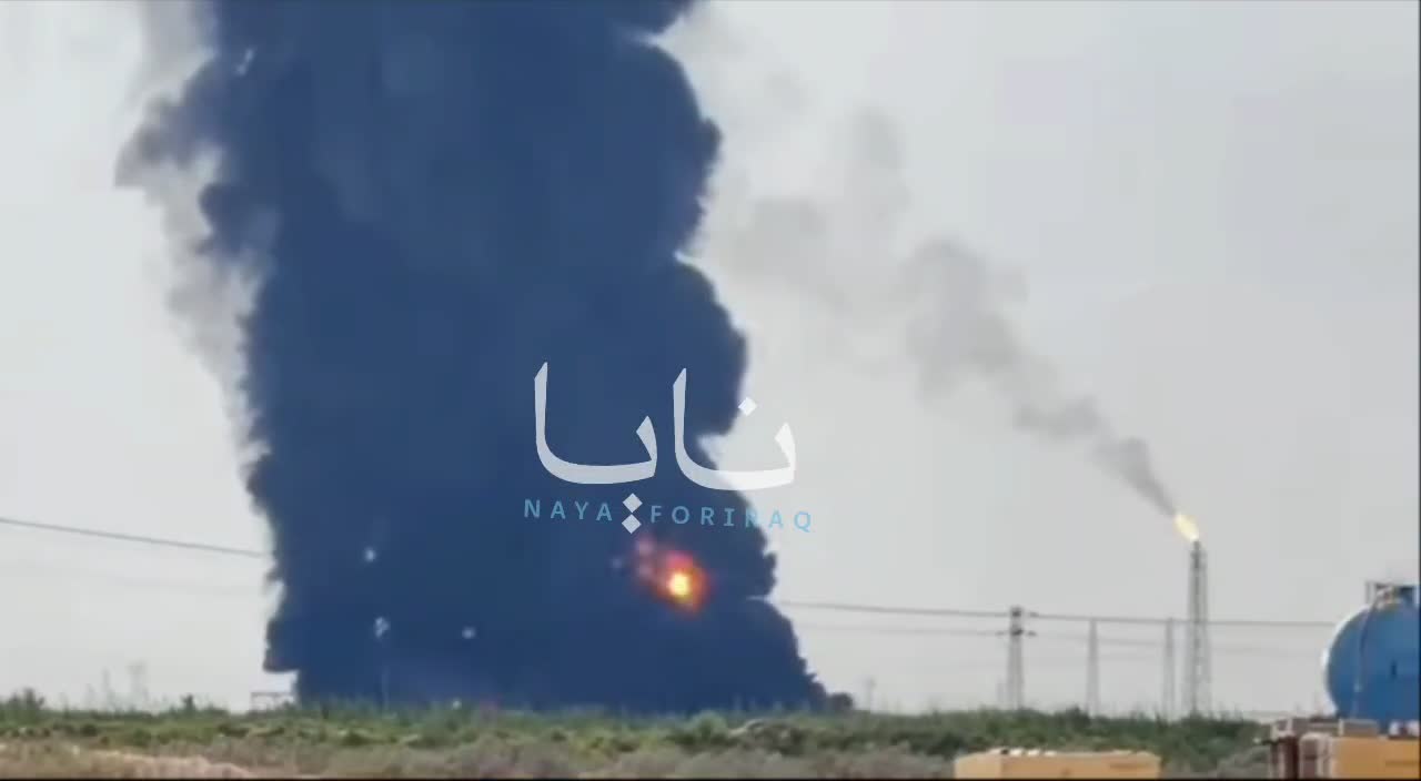 Plumes of smoke continue to rise from the Al-Ahdab oil field in Iraq's Wasit province.